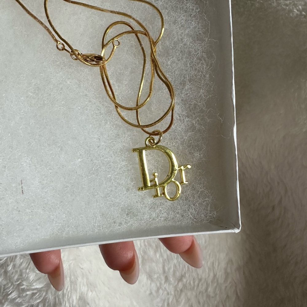 Gold-Tone D Logo Pendant Necklace - Picture 2 of 5